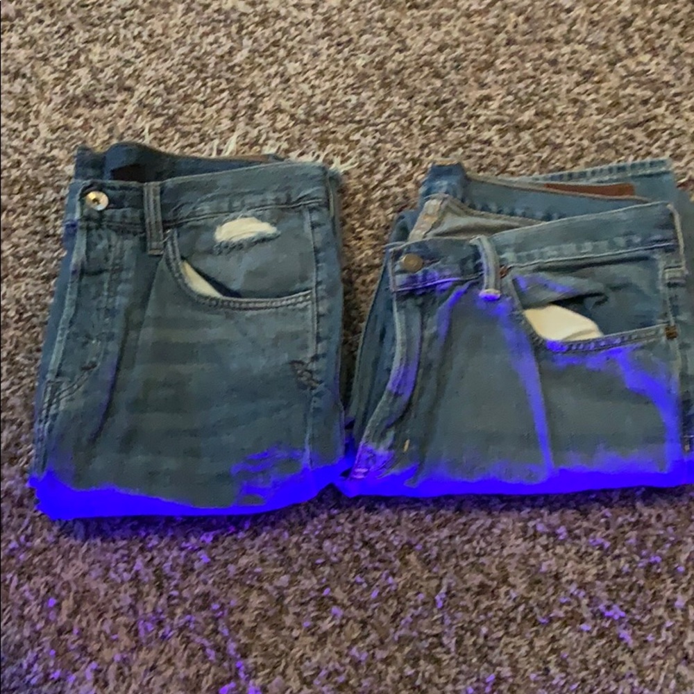 A pair of polo by Ralph Lauren and Denim shorts